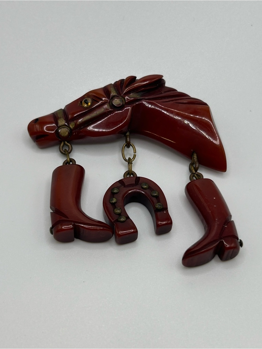 Vintage Bakelite Pin Brooch Red HORSE HEAD WITH 3 charms Original And Rare